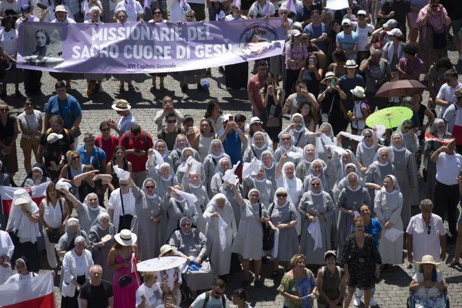 Religious sisters wave white cloths during Pope Francis' Angelus address on July 17, 2022
