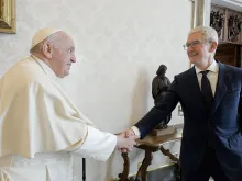 Pope Francis shakes hands with Apple CEO Tim Cook at the Vatican, Oct. 3, 2022.