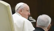 Pope Francis delivers a message at his general audience on Wednesday, Jan. 31, 2024.