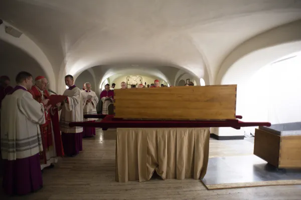 The coffin of Pope Benedict XVI is prepared for interment in the crypt of St. Peter's Basilica on Jan. 5, 2023. Vatican Media