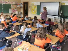 A classroom of St. Anthony of Padua School in Parma, Ohio, reopened in temporary facilities after a February arson.