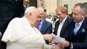 Aidan Gallagher, director of EWTN Ireland, receives a blessing for the film “Faith of Our Fathers” from Pope Francis after the pope’s general audience May 3, 2023.