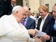 Aidan Gallagher, director of EWTN Ireland, receives a blessing for the film “Faith of Our Fathers” from Pope Francis after the pope’s general audience May 3, 2023.