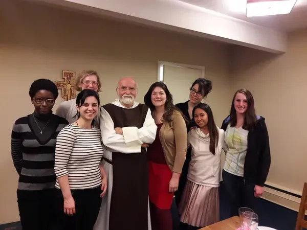 Most of "the original group" pictured with Father Jacques Philippe, who visited the house on Feb. 14, 2016. Philippe, a member of the Community of the Beatitudes in France, is known for his spiritual writings, including "Searching for and Maintaining Peace." From left to right: Stéphanie Baghoumina, Molly Gallagher, Alane Howard, Father Jacque Philippe, Michael Shelby Suberlak, Renee Corcoran, Francine Gregorios, and Molly McCloskey. Credit: Photo courtesy of Lisieux House