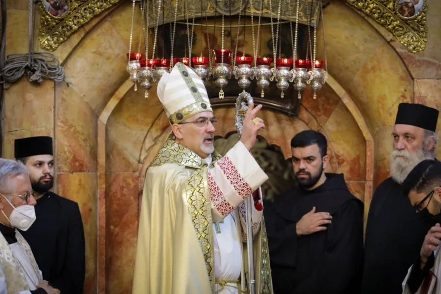 Patriarch Pierbattista Pizzaballa blesses the congregation at the Church of the Holy Sepulchre in Jerusalem on April 4, 2021.?w=200&h=150