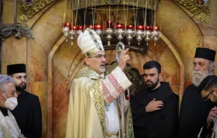 Patriarch Pierbattista Pizzaballa blesses the congregation at the Church of the Holy Sepulchre in Jerusalem on April 4, 2021. Latin Patriarchate of Jerusalem.