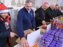 Supreme Knight Patrick Kelly of the Knights of Columbus helped assemble care packages prepared for Ukraine alongside Ukrainian refugees and Bishop Stolarczyk of Radom, Poland.