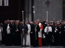 Synod members, led by Cardinal Gabetti, process into Saint Peter’s Basilica to pray the Rosary for Peace.