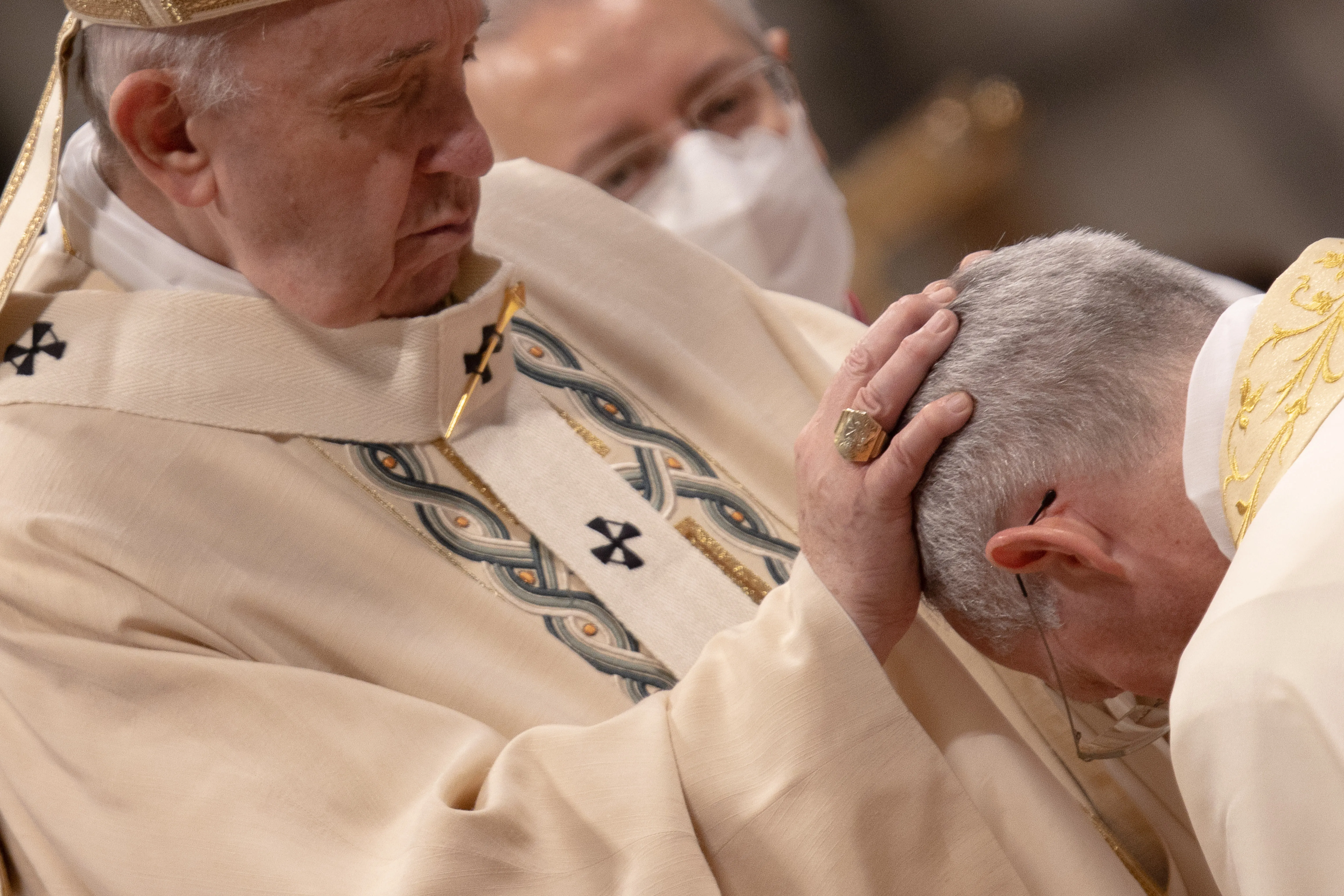Pope Francis lays his hands on the head of Guido Marini during his episcopal consecration in St. Peter's Basilica Oct. 17, 2021?w=200&h=150