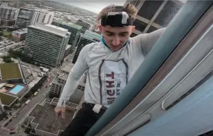 Maison DesChamps has assumed the brand of "pro-life spiderman" as he has scaled seven city skyscrapers to bring attention to the pro-life cause. In this photo, he is climbing the Accenture Tower in Chicago Oct. 10, 2023. Credit: Pro-Life Spiderman/YouTube Oct. 13, 2023