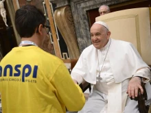 Pope Francis greets members of Italy's National Association of St. Paul on Thursday, Dec. 7, 2023.