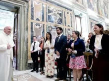 Students from the Vatican Observatory's summer school at an audience with Pope Francis