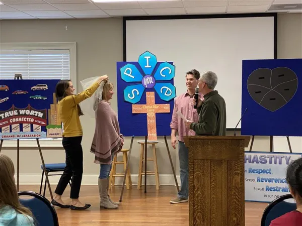 Participants discuss virtue, chastity, Christlike love, peer pressure, and improving parent-teen communication at Family Honor’s Real Love & Real Life program for parents with 7th and 8th graders, where. Credit: Family Honor, Inc.