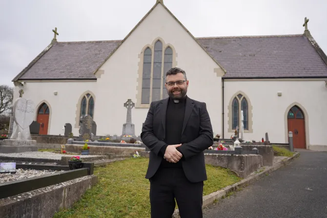 Father Owen Gorman stands outside of the Church of the Sacred Heart, one of his parishes in County Monaghan, Ireland.