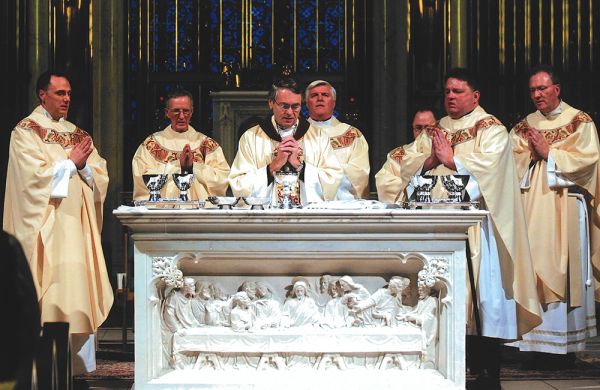 Bishop George Leo Thomas (center) celebrates the ordination Mass of Father Stuart Long (right front) at the Cathedral of St. Helena in 2007. Credit: Family of Father Stuart Long