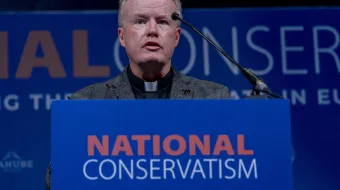 Father Benedict Kiely, founder of Nasarean.org, speaks during a panel discussion on Day 2 of The National Conservatism Conference at the Claridge on April 17, 2024, in Brussels, Belgium.