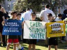 About 200 Orthodox Jewish families and individuals showed up for a rally outside a California court building on Friday, July 21, 2023, to express their support for religious liberty for disabled students.