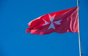 The flag of the Sovereign Military Order of Malta. Credit: AM113/Shutterstock