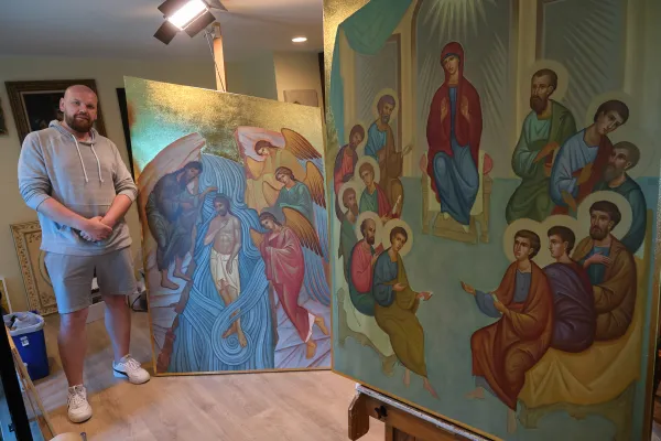 Kolodka with his nearly completed icons. The images were chosen to accentuate the Holy Spirit’s patronage of Holy Spirit Parish by depicting two of the most significant New Testament instances of the Holy Spirit working in the world: the baptism in the Jordan and Pentecost. Credit: Nicholas Elbers/B.C. Catholic