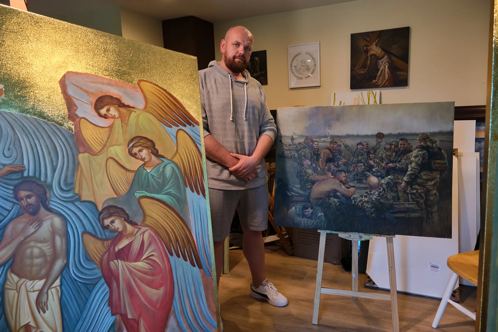 Ukrainian refugee and artist Serhii Kolodka in his studio at Holy Eucharist Ukrainian Catholic Cathedral, where he is putting the finishing touches on two large icons destined for Holy Spirit Parish in New Westminster, British Columbia, Canada.?w=200&h=150