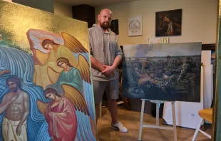 Ukrainian refugee and artist Serhii Kolodka in his studio at Holy Eucharist Ukrainian Catholic Cathedral, where he is putting the finishing touches on two large icons destined for Holy Spirit Parish in New Westminster, British Columbia, Canada. Credit: Nicholas Elbers/B.C. Catholic