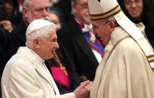 Pope Emeritus Benedict XVI is greeted by Pope Francis during the Ordinary Public Consistory at St. Peter’s Basilica on Feb. 14, 2015. Credit: Franco Origlia/Getty Images