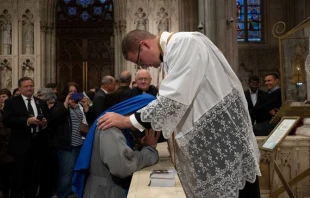 Father Matthew Breslin blesses his sister, Sr. Mary Strength of Martyrs, shortly after his May 29, 2021 ordination. Credit: Jeffrey Bruno.