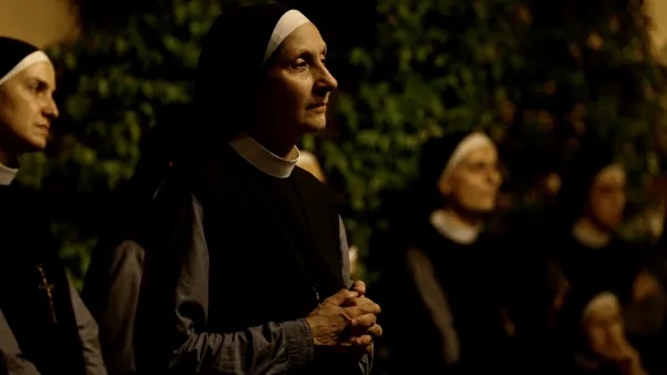 Religious sisters participate in a candlelight procession on July 14, 2023, in Bagnoregio, Italy, in honor of the town's patron saint and native son, St. Bonaventure. Patrick Leonard/CNA