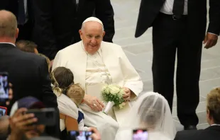 Pope Francis greets newly married couples at the general audience in the Vatican's Paul VI Hall on Aug. 30, 2023. Adi Zace/CNA