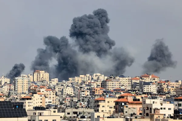 Smoke rises over Gaza City on Oct. 7, 2023, during an Israeli air strike. Palestinian militants have begun a "war" against Israel, the country's defense minister said on Oct.7 after a barrage of rockets were fired and fighters from the Palestinian enclave infiltrated Israel, a major escalation in the Israeli-Palestinian conflict. Credit: Mahmud Hams/AFP via Getty Images