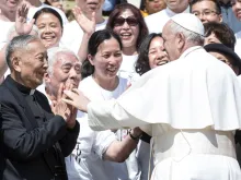 Pilgrims from China greets Pope Francis during his general weekly audience in St. Peter's Square on May 22, 2019, at the Vatican.