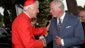 Then-Prince Charles greets archbishop of Westminster and president of the Catholic Bishops' Conference of England and Wales Cardinal Vincent Gerard Nichols during a reception for the Cardinal Newman Canonization at Pontifical Urban College on Oct. 13, 2019, at the Vatican.