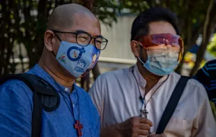 Fathers Flaviano “Flavie” Villanueva (left) and Albert Alejo speak to the media before appearing for court on Feb. 11, 2021, in Quezon City, Metro Manila, Philippines. Credit: Ezra Acayan/Getty Images