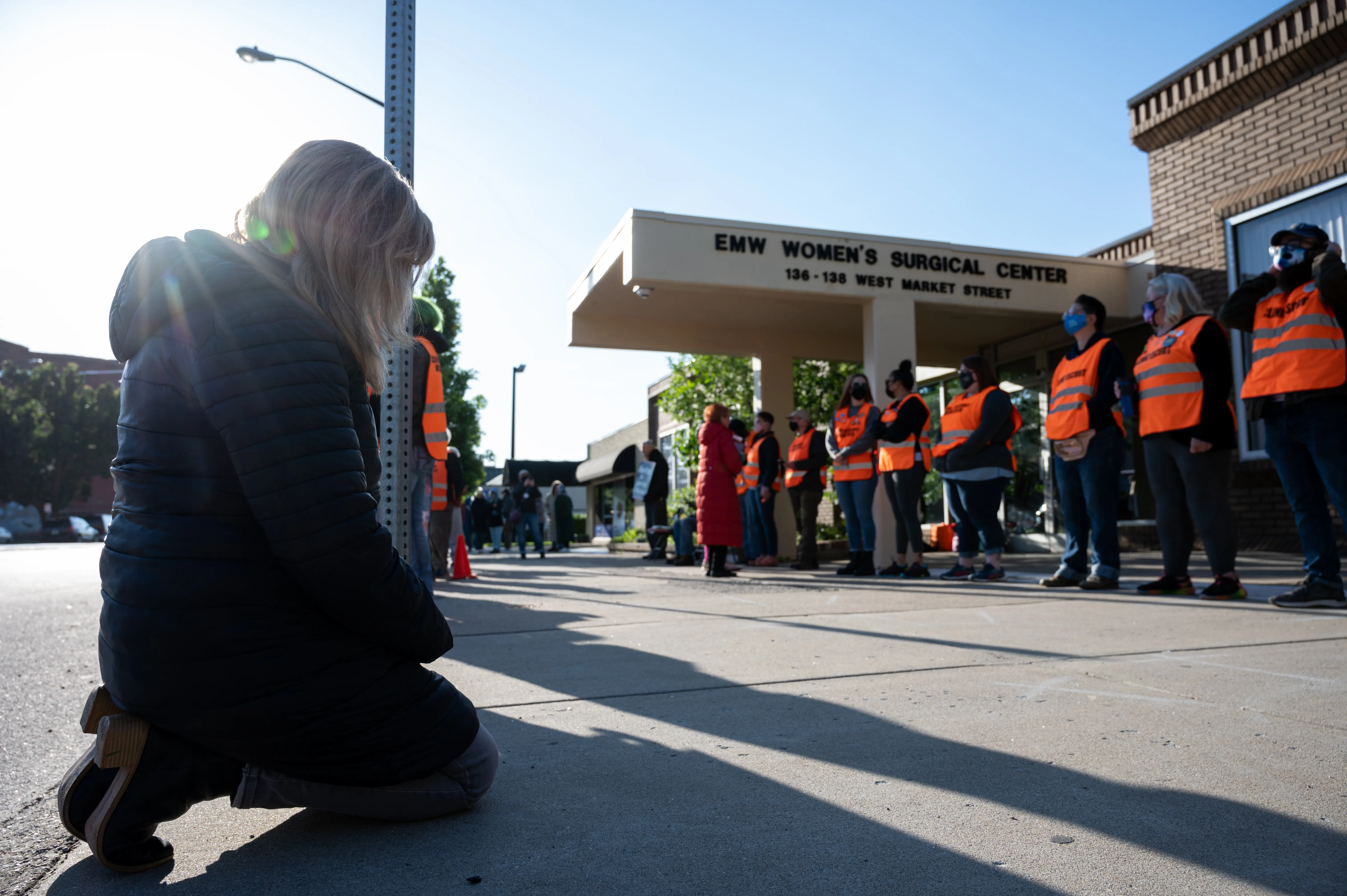 A pro-life woman kneels in prayer in front of the EMW Women's Surgical Center, an abortion clinic, in Louisville, Kentucky, on May 8, 2021.?w=200&h=150
