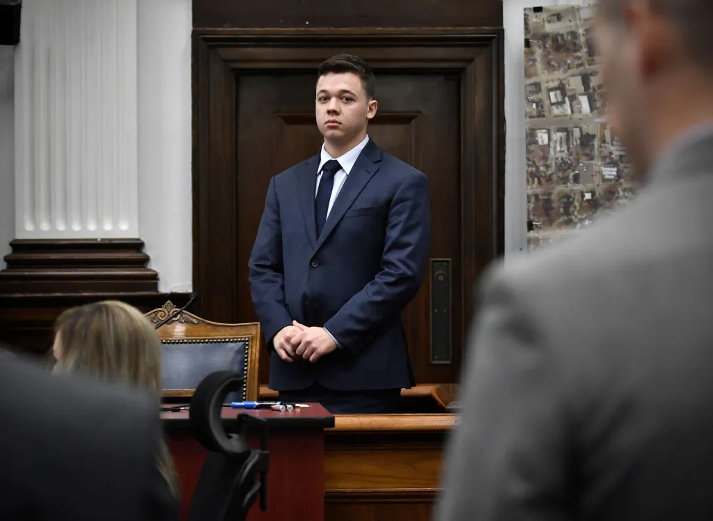 Kyle Rittenhouse waits for the jury to enter the room to continue testifying during his trial at the Kenosha County Courthouse on November 10, 2021 in Kenosha, Wisconsin. Rittenhouse is accused of shooting three demonstrators, killing two of them, during a night of unrest that erupted in Kenosha after a police officer shot Jacob Blake seven times in the back while being arrested in August 2020. Rittenhouse, from Antioch, Illinois, was 17 at the time of the shooting and armed with an assault rifle. He faces counts of felony homicide and felony attempted homicide.?w=200&h=150