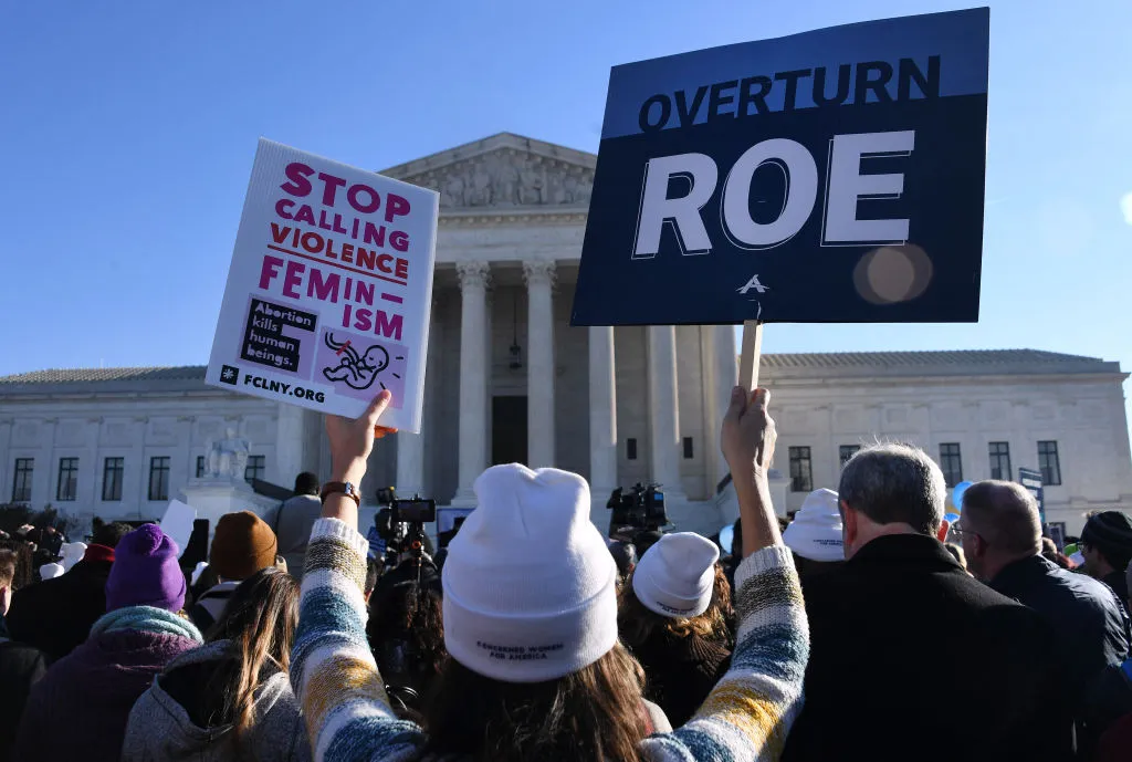 Pro-life advocates demonstrate in front of the US Supreme Court in Washington, DC, on December 1, 2021. - The justices weigh whether to uphold a Mississippi law that bans abortion after 15 weeks and overrule the 1973 Roe v. Wade decision.?w=200&h=150