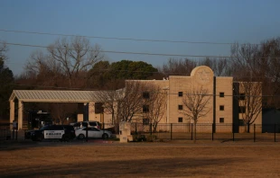A police car sits in front of the Congregation Beth Israel Synagogue in Colleyville, Texas, some 25 miles west of Dallas, Jan. 16, 2022. - All four people taken hostage in a more than 10-hour standoff at the Texas synagogue have been freed unharmed, police said late Jan. 15, and their suspected captor is dead. Andy Jacobsohn/AFP via Getty Images.
