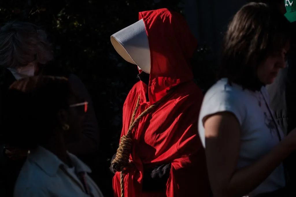 Pamela Smith dressed as characters of "The Handmaids Tale" walks with a noose around her neck as she joins pro-choice protesters gather in large numbers in front of the federal building to defend abortion rights in San Francisco on May 3, 2022.?w=200&h=150