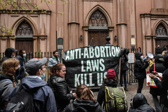 Abortion-rights activists gather outside of a Catholic church in downtown Manhattan to voice their support for a woman's right to choose on May 07, 2022 in New York City.