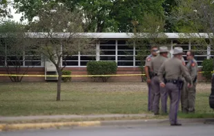 State troopers stand outside of Robb Elementary School in Uvalde, Texas, on May 24, 2022. - An 18-year-old gunman killed 14 children and a teacher at an elementary school in Texas on Tuesday, according to the state's governor, in the nation's deadliest school shooting in years. Allison Dinner/AFP via Getty Images