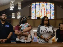 Parishioners mourn at Sacred Heart Catholic Church on May 25, 2022 in Uvalde, Texas. On May 24, 21 people were killed, including 19 children, during a mass shooting at Robb Elementary School. The shooter, identified as 18-year-old Salvador Ramos, was reportedly killed by law enforcement.
