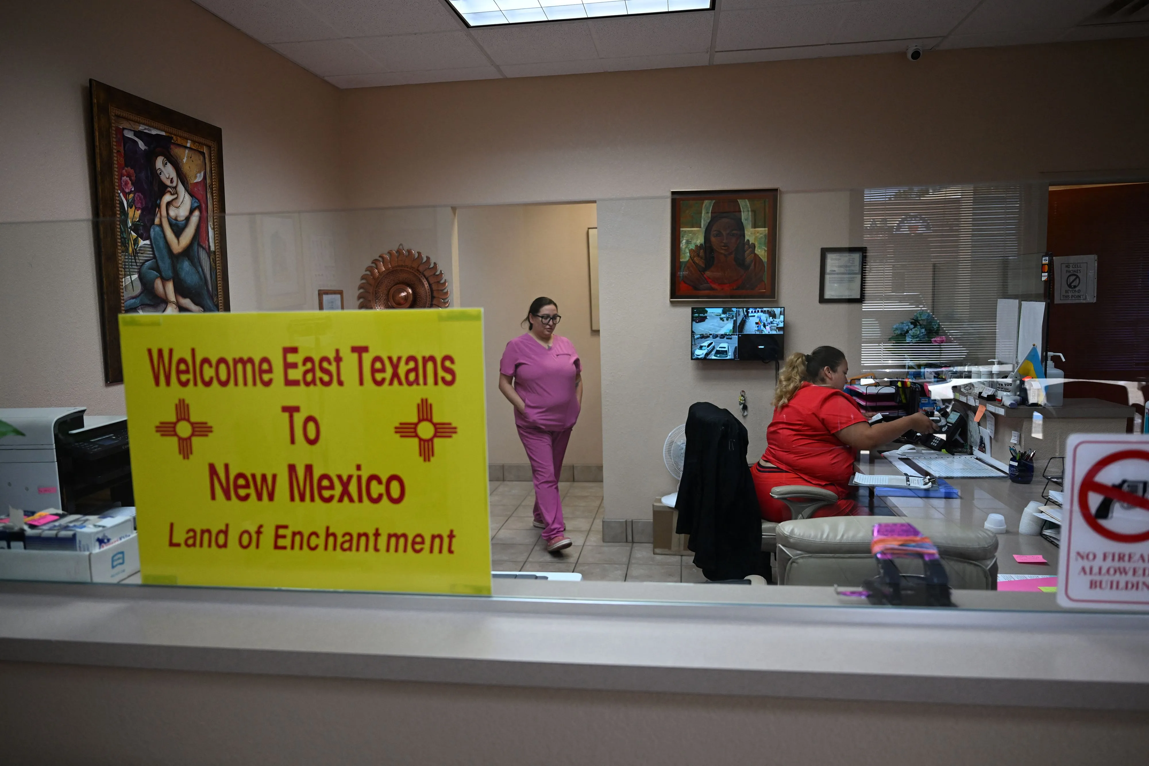 A sign welcoming patients from East Texas is displayed in the waiting area of the Women's Reproductive Clinic, which provides legal medication abortion services, in Santa Teresa, New Mexico, on June 15, 2022.?w=200&h=150