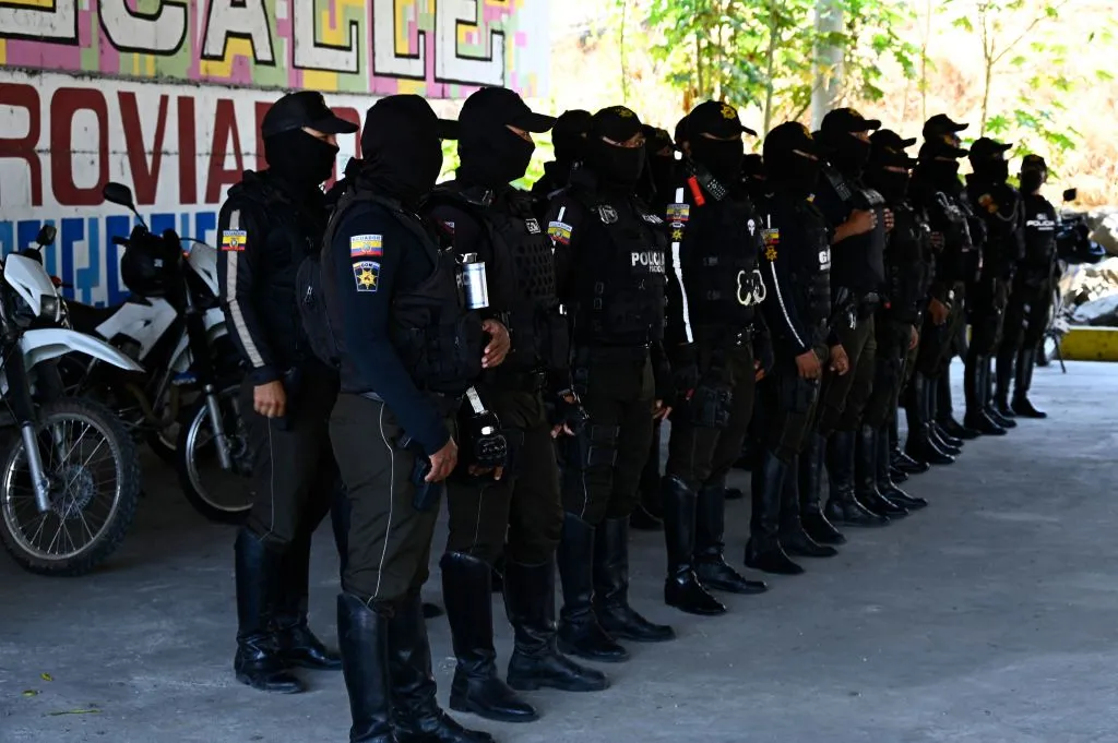 Members of the National Police prepare before going out to patrol the streets of Duran, city neighbouring Guayaquil, Ecuador, on Nov. 5, 2022. Special police forces continued on Friday, Nov. 4, 2022 to transfer imprisoned criminal gang leaders who have unleashed terror in Guayaquil as part of the government's "open war" against drug trafficking.?w=200&h=150