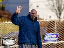 Democrat U.S. Senate candidate John Fetterman arrives to cast his ballot at New Hope Baptist Church in Braddock, Pennsylvania, on Nov. 8, 2022.
