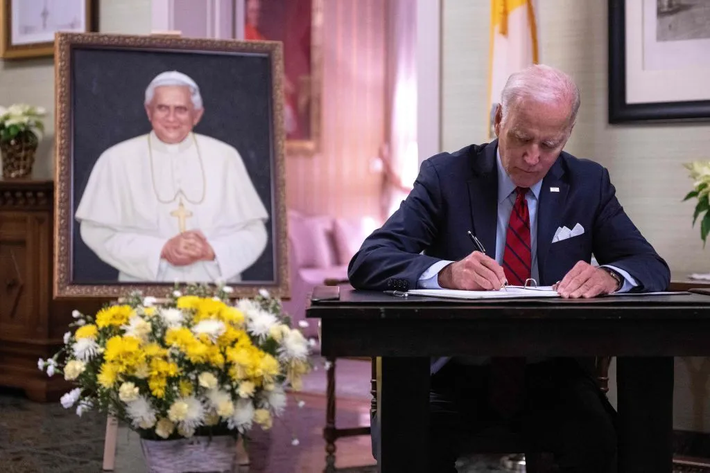 U.S. President Joe Biden signs the condolence book for Pope Emeritus Benedict XVI at the Apostolic Nunciature of the Holy See in Washington, D.C., on Jan. 5, 2023.?w=200&h=150