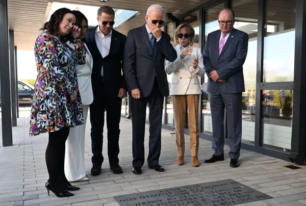 Laurita Blewitt (left), cousin of President Joe Biden (center), Hunter Biden (third from left), Mike Smith (right), Chairman and Martina Jennings (second from left), CEO of Mayo Roscommon Hospice Foundation, and Valerie Biden Owens (second from right) view a plaque to President Biden's late son Beau outside Mayo Roscommon Hospice and Palliative Care Center in the West of Ireland on April 14, 2023, on the last day of a four day trip to Northern Ireland and Ireland. Photo by JIM WATSON/AFP via Getty Images
