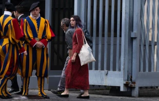 Ultima Generazione (Last Generation) climate change activists Ester Goffi (right) and Guido Viero (second right) arrive at the Vatican on May 24, 2023, to attend their second hearing for having glued themselves to the statue of "Laocoon and His Sons" at the Vatican Museums in August 2022. Credit: TIZIANA FABI/AFP via Getty Images