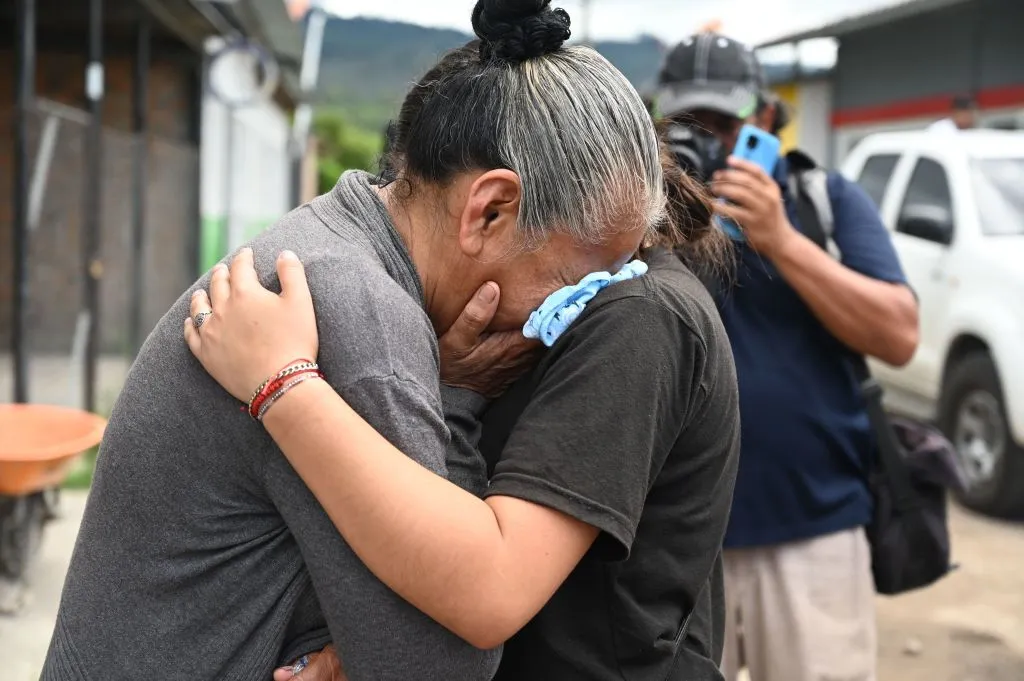 Relatives of inmates of the Women's Center for Social Adaptation (CEFAS) prison cry outside the detention center after a fire following a brawl between inmates in Tamara, some 25 kilometers from Tegucigalpa, Honduras, on June 20, 2023.?w=200&h=150