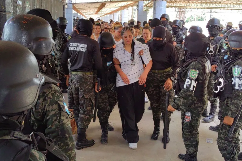 Members of the Military Police of Public Order (PMOP) take control of the Women's Social Adaptation Center (CEFAS) prison in Tamara, 25 km north of Tegucigalpa, on June 26, 2023. The government announced last week that military police would assume control of Honduras's 21 prisons for a period of one year starting July 1, as well as train 2,000 new prison guards after a vicious battle between rival gangs left at least 46 women dead in a prison near the capital Tegucigalpa.?w=200&h=150