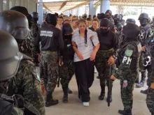 Members of the Military Police of Public Order (PMOP) take control of the Women's Social Adaptation Center (CEFAS) prison in Tamara, 25 km north of Tegucigalpa, on June 26, 2023. The government announced last week that military police would assume control of Honduras's 21 prisons for a period of one year starting July 1, as well as train 2,000 new prison guards after a vicious battle between rival gangs left at least 46 women dead in a prison near the capital Tegucigalpa.